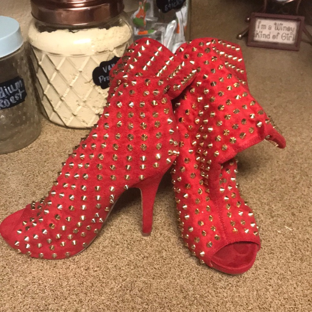 Suede red boots with gold spike detail